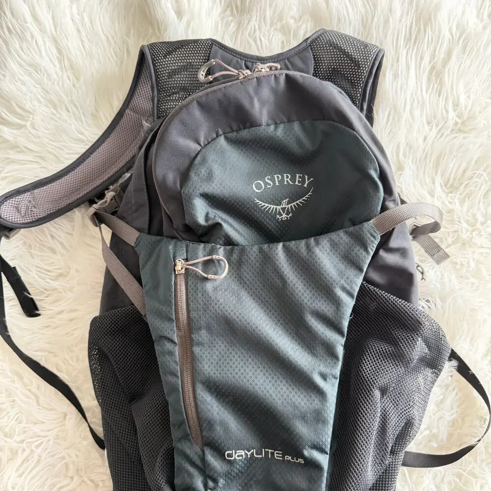 Osprey Daylite Plus Backpack in Black featuring a front stash pocket - Picture 2 of 14